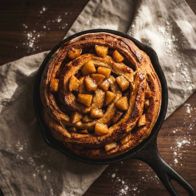Sourdough cinnamon bun filled with spiced caramelized apple